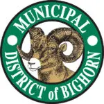 A green and white logo with an image of a ram.